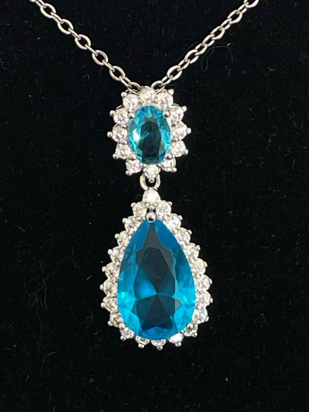 Blue Aquamarine Teardrop Pendant Necklace with Clear Halo Accents